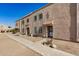Street view of a townhome, featuring clean design and covered entry at 8226 N 32Nd Dr, Phoenix, AZ 85051