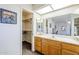 Bright bathroom with a large vanity, ample counter space and walk-in closet at 8320 E Nido Ave, Mesa, AZ 85209