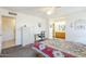 Spacious bedroom featuring neutral walls and attached bath, with study desk at 8320 E Nido Ave, Mesa, AZ 85209