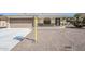 Charming home with a two-car garage, decorative brick accents, and desert landscaping at 8320 E Nido Ave, Mesa, AZ 85209