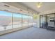 Enclosed sunroom offers an enjoyable space with outdoor views and plenty of natural light at 8320 E Nido Ave, Mesa, AZ 85209
