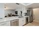 Modern kitchen featuring stainless steel appliances, quartz countertops, and white cabinetry at 903 W Barrow Dr, Chandler, AZ 85225