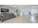 Spacious living room featuring an open floor plan to the dining room and kitchen area at 903 W Barrow Dr, Chandler, AZ 85225