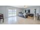 Inviting living room with sliding door access to a backyard patio and natural light at 903 W Barrow Dr, Chandler, AZ 85225