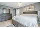 Spacious main bedroom featuring neutral walls, light-colored hardwood floors, and lots of space at 903 W Barrow Dr, Chandler, AZ 85225