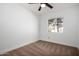 Bedroom featuring plush carpet, a ceiling fan, and a window for natural light at 907 W Laguna Dr, Tempe, AZ 85282
