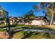 Well maintained exterior with front yard with pet waste disposal unit located in the common area at 907 W Laguna Dr, Tempe, AZ 85282