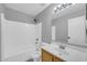 Clean and bright bathroom with white shower and vanity at 9230 N 82Nd Ln, Peoria, AZ 85345