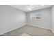 Bedroom with carpet, ceiling fan, and a window bringing in natural light at 9230 N 82Nd Ln, Peoria, AZ 85345