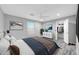 Inviting bedroom with a walk-in closet, ceiling fan, and neutral decor at 9230 N 82Nd Ln, Peoria, AZ 85345
