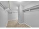 This closet features white shelves and gray walls at 9230 N 82Nd Ln, Peoria, AZ 85345