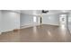 Living room featuring tile floors, neutral paint, a ceiling fan, and lots of open space at 9230 N 82Nd Ln, Peoria, AZ 85345