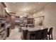 Open kitchen featuring granite countertops, double islands, and stainless steel appliances at 10365 E Paradise Dr, Scottsdale, AZ 85260