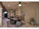 Covered patio with outdoor dining and seating area, perfect for entertaining at 10365 E Paradise Dr, Scottsdale, AZ 85260
