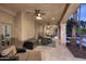 Covered patio with ample seating and dining areas offering views of the pool and landscaping at 10365 E Paradise Dr, Scottsdale, AZ 85260