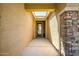 Welcoming home entrance with stone accents, skylight, and covered walkway at 10635 W Eucalyptus Rd, Peoria, AZ 85383