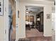 Home office with a large, dark wood desk, leather chair and built-in shelving at 10635 W Eucalyptus Rd, Peoria, AZ 85383