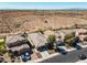 Birds-eye view featuring a community with well-maintained homes and desert surroundings at 10635 W Eucalyptus Rd, Peoria, AZ 85383