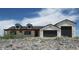 Charming single-Gathering home featuring dormer windows and a three car garage, perfect for a modern lifestyle at 11142 E Copper Dust Trl, Florence, AZ 85132