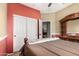 Bedroom with carpet and large closet at 11713 W Tonto St, Avondale, AZ 85323