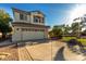 Attractive stucco home with a two-car garage, tidy landscaping, and a sunny curb appeal at 11713 W Tonto St, Avondale, AZ 85323