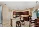 Bright kitchen featuring a kitchen island, breakfast bar and stainless steel appliances at 11713 W Tonto St, Avondale, AZ 85323