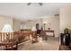 Spacious loft area with comfortable seating, tables, and railing at 11713 W Tonto St, Avondale, AZ 85323