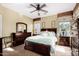 Comfortable main bedroom features neutral paint, coordinated furniture set and bright natural light at 11713 W Tonto St, Avondale, AZ 85323