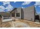 Backyard featuring a pool under construction, a stone patio and desert landscaping at 12328 E Black Rock Rd, Scottsdale, AZ 85255