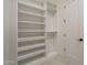 Spacious closet with customizable shelving and hanging rods for optimal organization at 12328 E Black Rock Rd, Scottsdale, AZ 85255