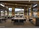 Relaxing outdoor dining area with comfortable seating, mountain views, and shade umbrellas at 12328 E Black Rock Rd, Scottsdale, AZ 85255