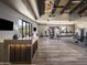 Bright and spacious fitness center with modern equipment, sleek flooring, and large windows with mountain views at 12328 E Black Rock Rd, Scottsdale, AZ 85255