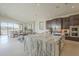 Open-concept kitchen showcasing a large island with granite countertops, stainless steel appliances, and ample cabinetry at 12328 E Black Rock Rd, Scottsdale, AZ 85255