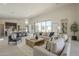 Inviting open-concept living area blending kitchen, dining, and lounging spaces with abundant natural light at 12328 E Black Rock Rd, Scottsdale, AZ 85255