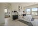 Serene main bedroom featuring neutral colors, luxurious linens, and plenty of natural light at 12328 E Black Rock Rd, Scottsdale, AZ 85255