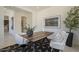 Stylish home office featuring a wooden desk, comfortable chairs, and tasteful decor at 12328 E Black Rock Rd, Scottsdale, AZ 85255