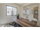Bright office space with large windows, a modern desk, and comfortable seating at 12328 E Black Rock Rd, Scottsdale, AZ 85255