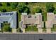 Aerial view showing the roof of the home with solar panels, backyard, and landscaping at 12519 W Castle Rock Dr, Sun City West, AZ 85375