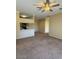 Inviting living room with overhead lighting and breakfast bar overlooking the kitchen at 16013 S Desert Foothills Pkwy # 1050, Phoenix, AZ 85048