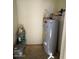 Water heater positioned in a utility room with room for additional storage at 16013 S Desert Foothills Pkwy # 1050, Phoenix, AZ 85048