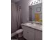 A full bathroom with gray walls, and double sinks at 1875 N St Francis Pl, Casa Grande, AZ 85122