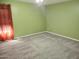 Bedroom with carpet, and a window with red curtains at 1875 N St Francis Pl, Casa Grande, AZ 85122