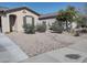 Landscaped front yard with desert foliage and a charming, single-story home at 1875 N St Francis Pl, Casa Grande, AZ 85122