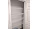 Walk-in pantry with white wire shelving for ample storage at 1875 N St Francis Pl, Casa Grande, AZ 85122