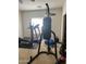 Home gym featuring a treadmill and elliptical machine for a personal fitness space at 19427 N Toya St, Maricopa, AZ 85138