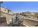 Outdoor patio with neighborhood views and a glass patio table at 19475 N Grayhawk Dr # 2132, Scottsdale, AZ 85255