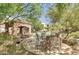 Charming community area featuring a shaded patio, lounge seating, and access to the community pool at 19475 N Grayhawk Dr # 2132, Scottsdale, AZ 85255