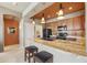 Spacious kitchen with granite countertops and modern pendant lighting at 19475 N Grayhawk Dr # 2132, Scottsdale, AZ 85255