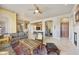 Spacious living room featuring neutral paint, tile floors and ample natural light at 19475 N Grayhawk Dr # 2132, Scottsdale, AZ 85255