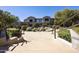 Beautifully landscaped pond with a waterfall feature, accessible by stone stairs at 19475 N Grayhawk Dr # 2132, Scottsdale, AZ 85255